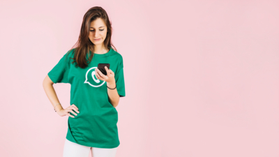sad-young-woman-using-mobile-phone-against-pink-backdrop